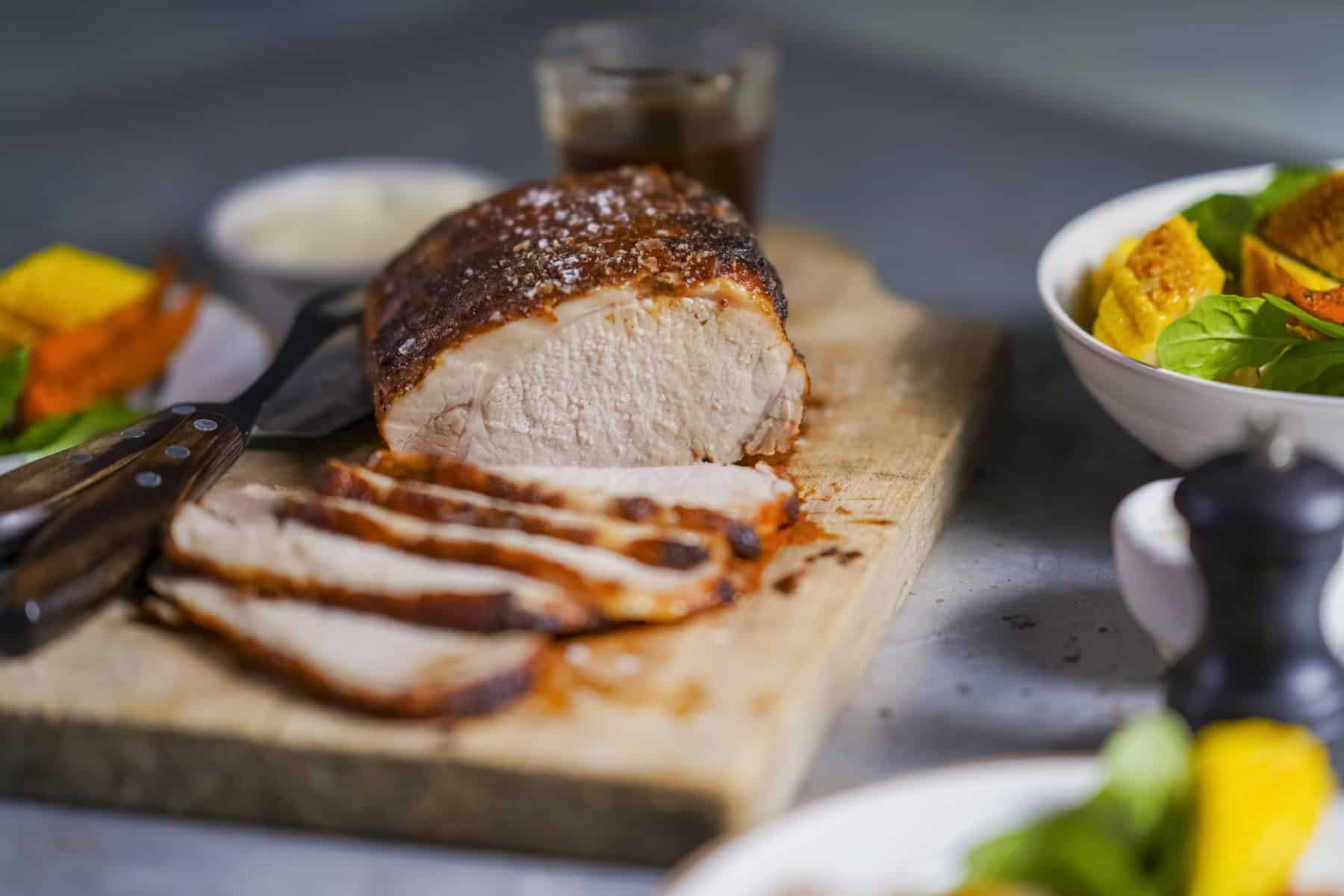 Smoky pork loin with Cajun roasted sweet potato & corn