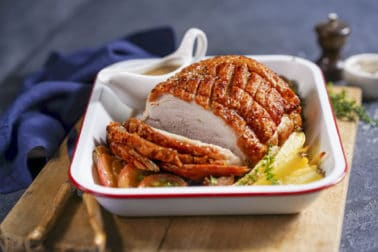 Garlic roast pork with caramelised apples & parsnips